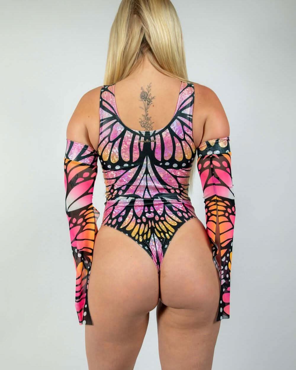 Back view of the Monarch Keyhole Bodysuit showcasing vibrant butterfly design, ideal for rave outfits and clothing.
