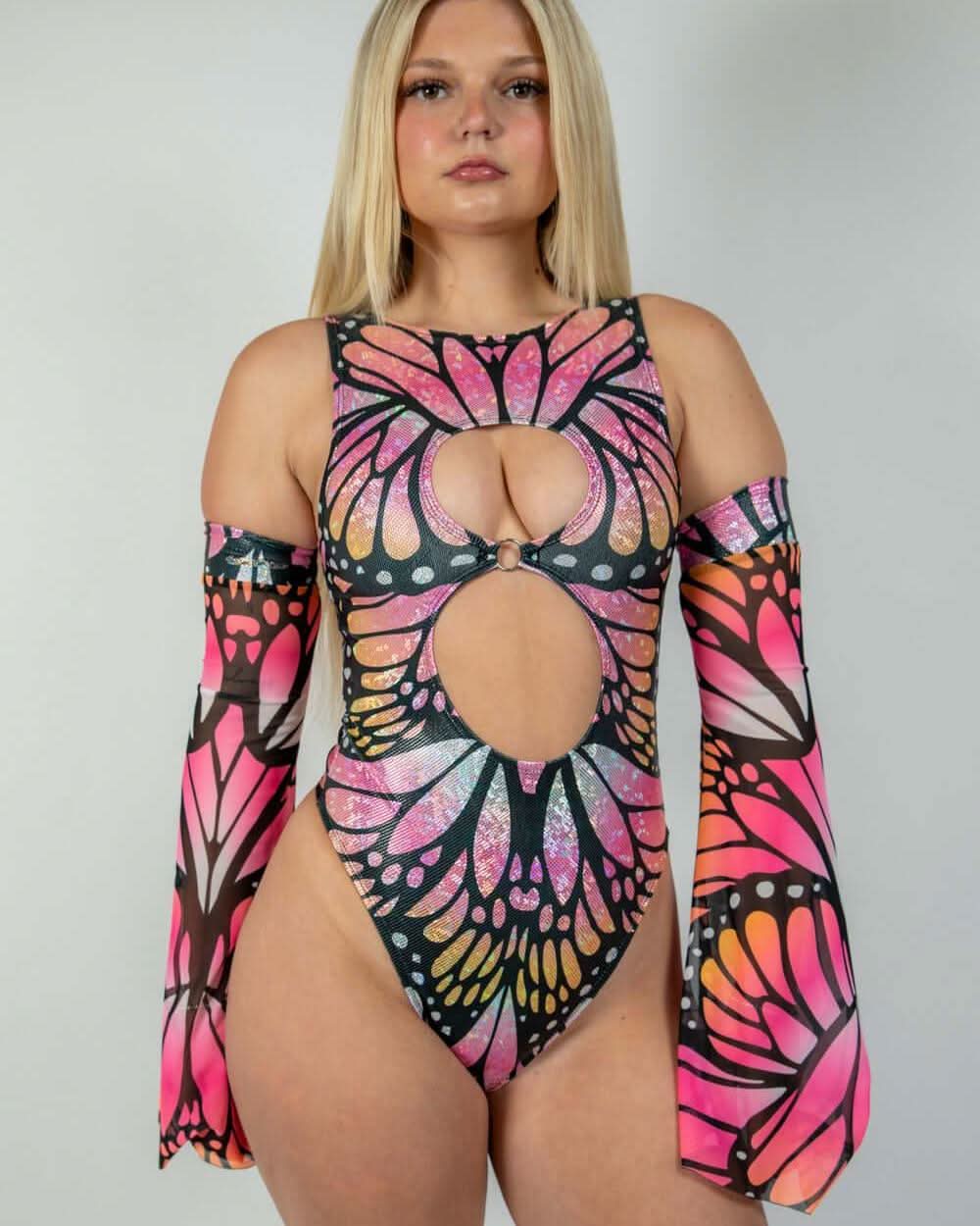Pink orange Monarch butterfly rave bodysuit with keyhole cutouts and matching arm sleeves front view
