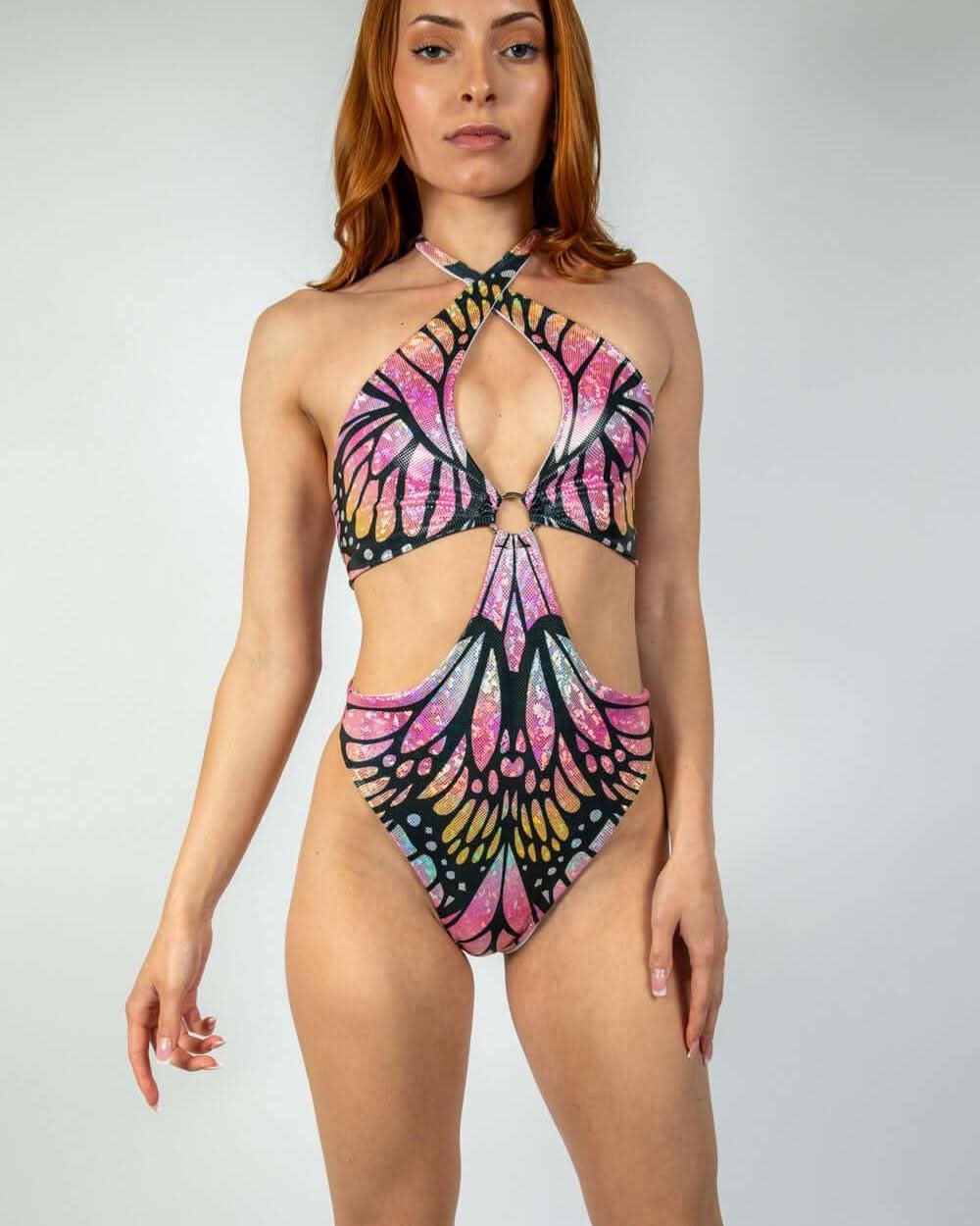 Model wearing a colorful Monarch O-Ring Bodysuit, showcasing rave outfits and versatile rave clothing style.