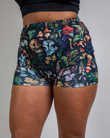 Poison High Waist Shorts with bold skull and floral print, perfect for stylish rave outfits and designed for a comfortable fit.