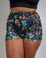 Poison High Waist Shorts with skull and mushroom print, perfect for rave outfits, offering a comfortable, flattering fit.