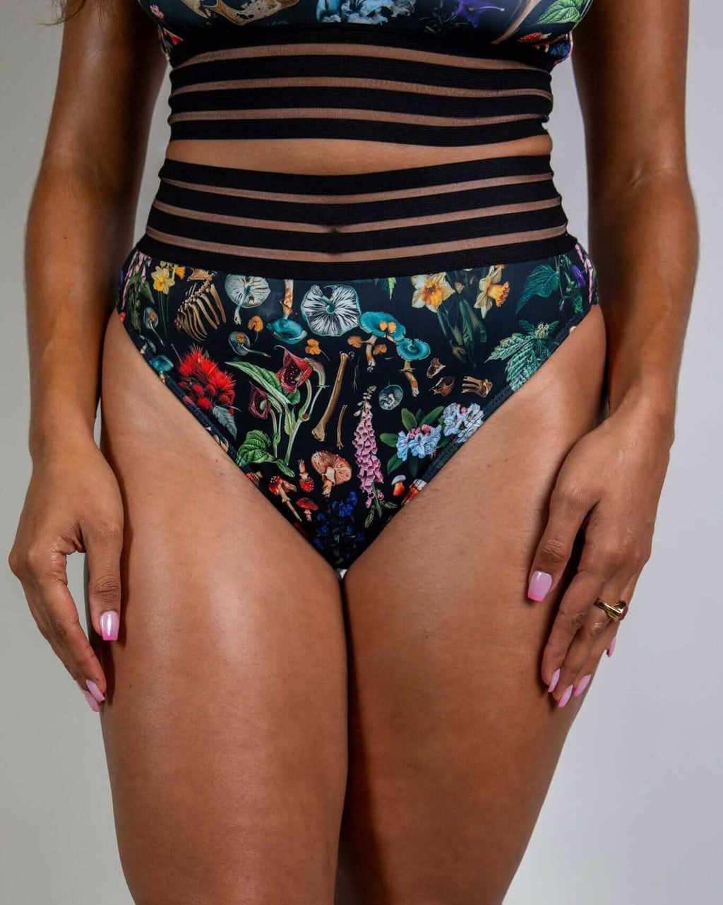 Poison Sporty Bottoms with skull and mushroom print, high-waisted fit, perfect for rave outfits.