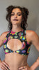 Video of a psychedelic mushroom print rave set by Freedom Rave Wear, featuring a cut-out halter top and matching high-waisted bottoms. Bold and vibrant design.