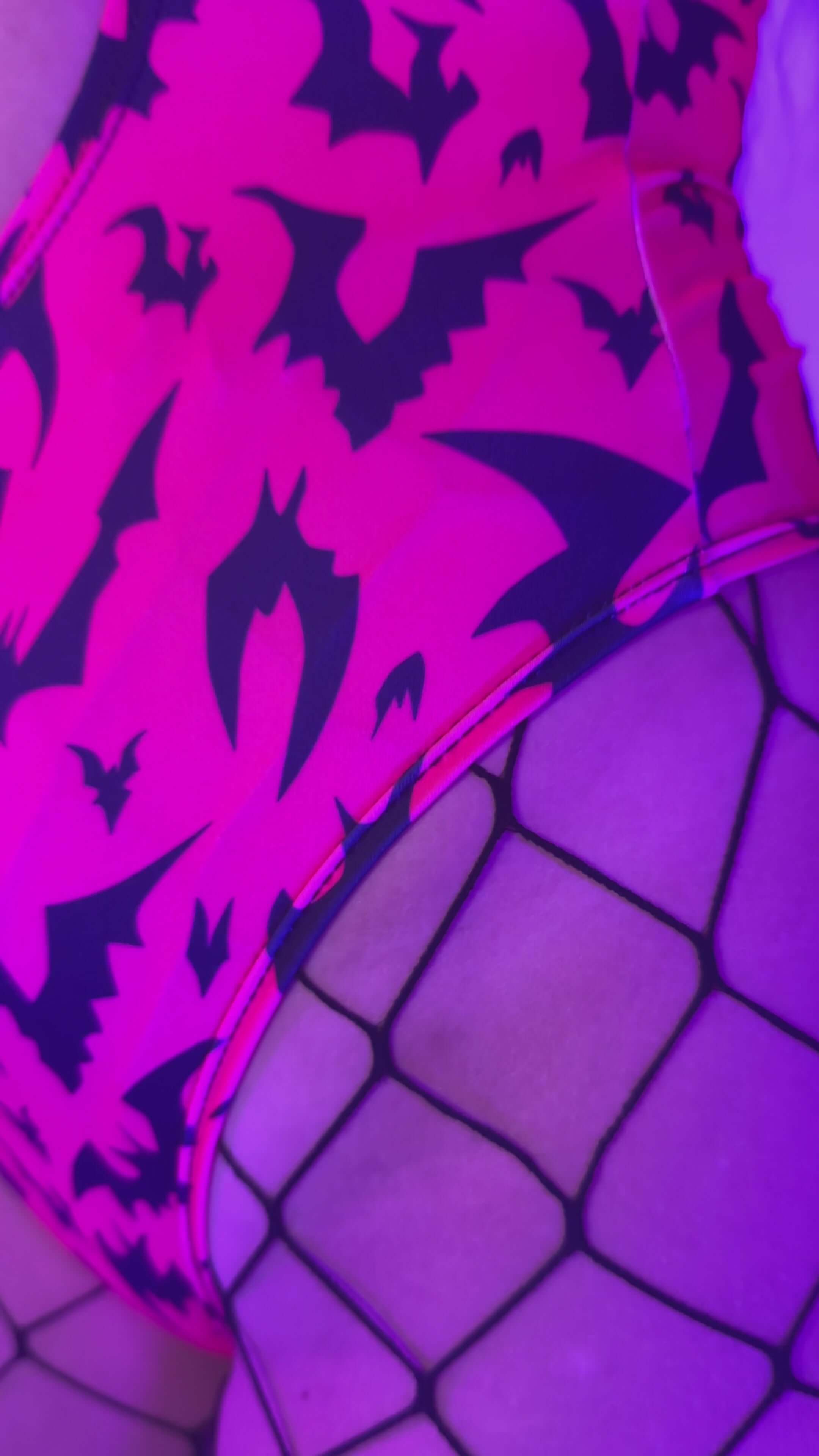 Red Batty Keyhole Bodysuit - UV Red featuring bold bat print and fishnet details for Rave Outfits.