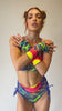 Video of a model wearing vibrant Freedom Rave Wear gloves, making a bold statement with colorful festival accessories.