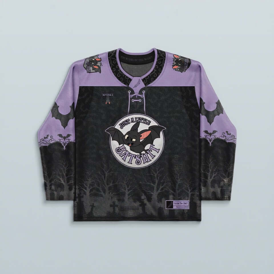 Batshit Hockey Jersey - Limited Editon featuring a shadowy graveyard and bats design, perfect for rave outfits.
