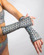 Model wearing Prism rave arm sleeves with holographic geometric pattern in crossed pose front view