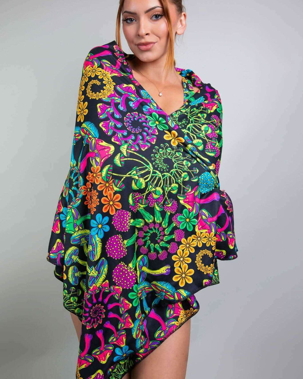 Model wearing the PsyBloom Festival Scarf, showcasing vibrant floral patterns perfect for rave outfits and festivals.