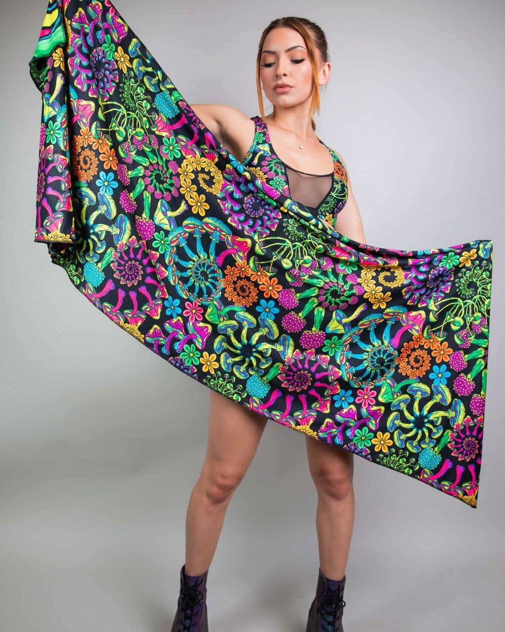 Model showcasing vibrant PsyBloom Festival Scarf with colorful floral design, perfect for rave outfits.