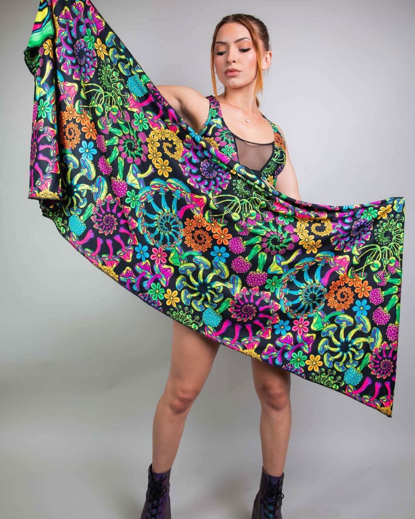 Model showcasing vibrant PsyBloom Festival Scarf with colorful floral design, perfect for rave outfits.