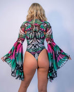 Back view of Flutter Mesh Bell rave arm sleeves with colorful butterfly wing pattern in pink and teal
