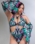 Flutter Metamorphosis rave arm sleeves in holographic butterfly pattern worn by model in festival outfit front pose