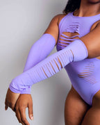 Lavender rave arm sleeves with slit cutouts styled with matching bodysuit for festival outfit