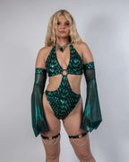 Predator Metamorphosis rave arm sleeves in emerald green with flowing bell shape on model front view