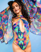 Model wearing Vivid mesh bell sleeves rave arm sleeves with matching psychedelic print swimsuit festival outfit