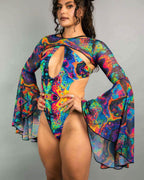 Model wearing Vivid Mesh rave arm sleeves with psychedelic swirl pattern festival outfit front view