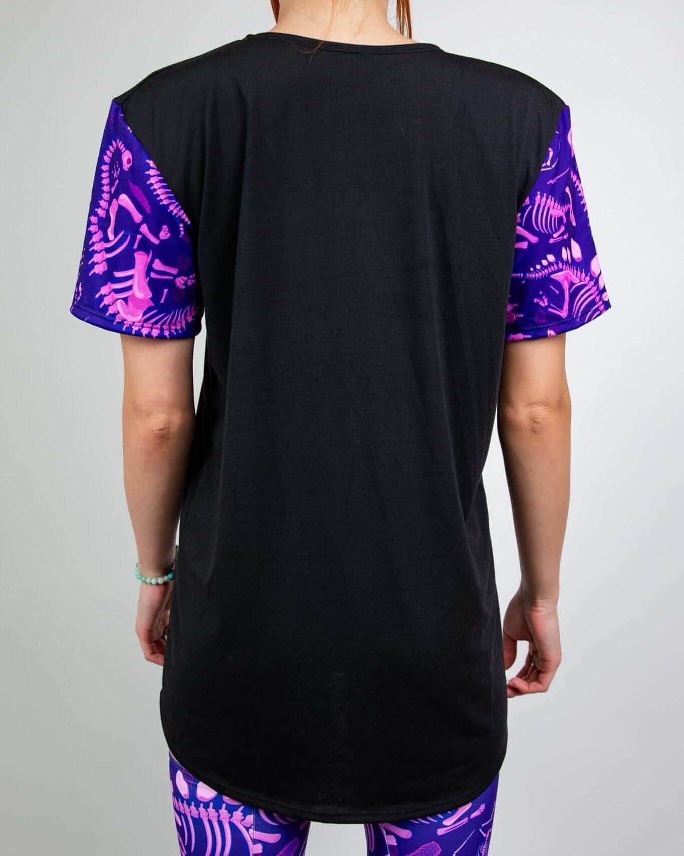 Rave bodysuit inspired Baby Steps unisex t-shirt back view showing purple dinosaur fossil festival outfit sleeves