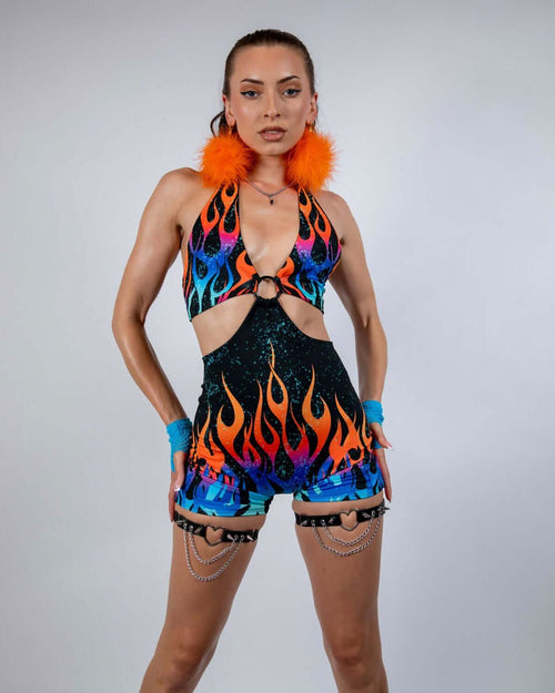 Rave bodysuit in Blaze flame pattern with orange fur trim, front view on model