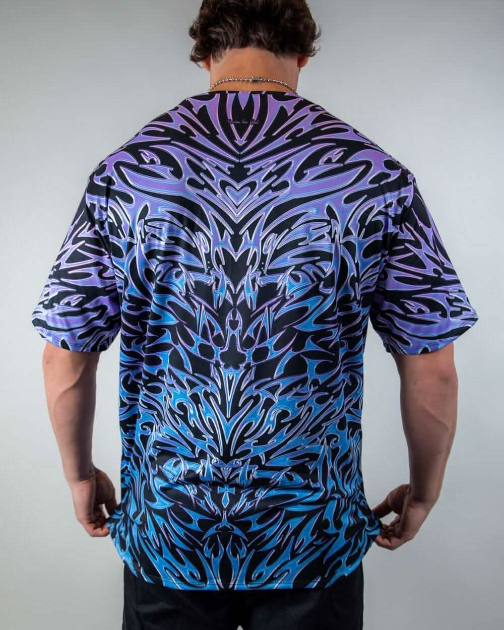 Rave bodysuit style Chromium Oversized Softee back view showing blue purple holographic cyber print festival outfit