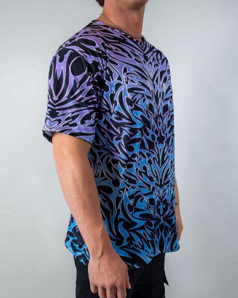 Rave bodysuit alternative - Chromium oversized festival shirt with purple blue gradient print, male model side view