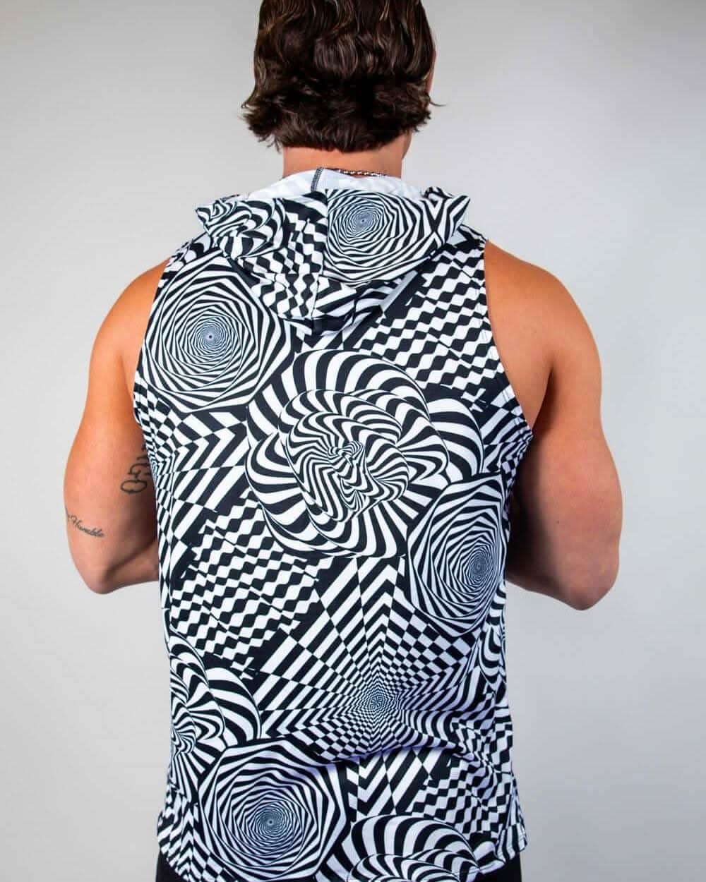 Male model wearing black white Distortion hooded rave bodysuit tank top back view festival outfit