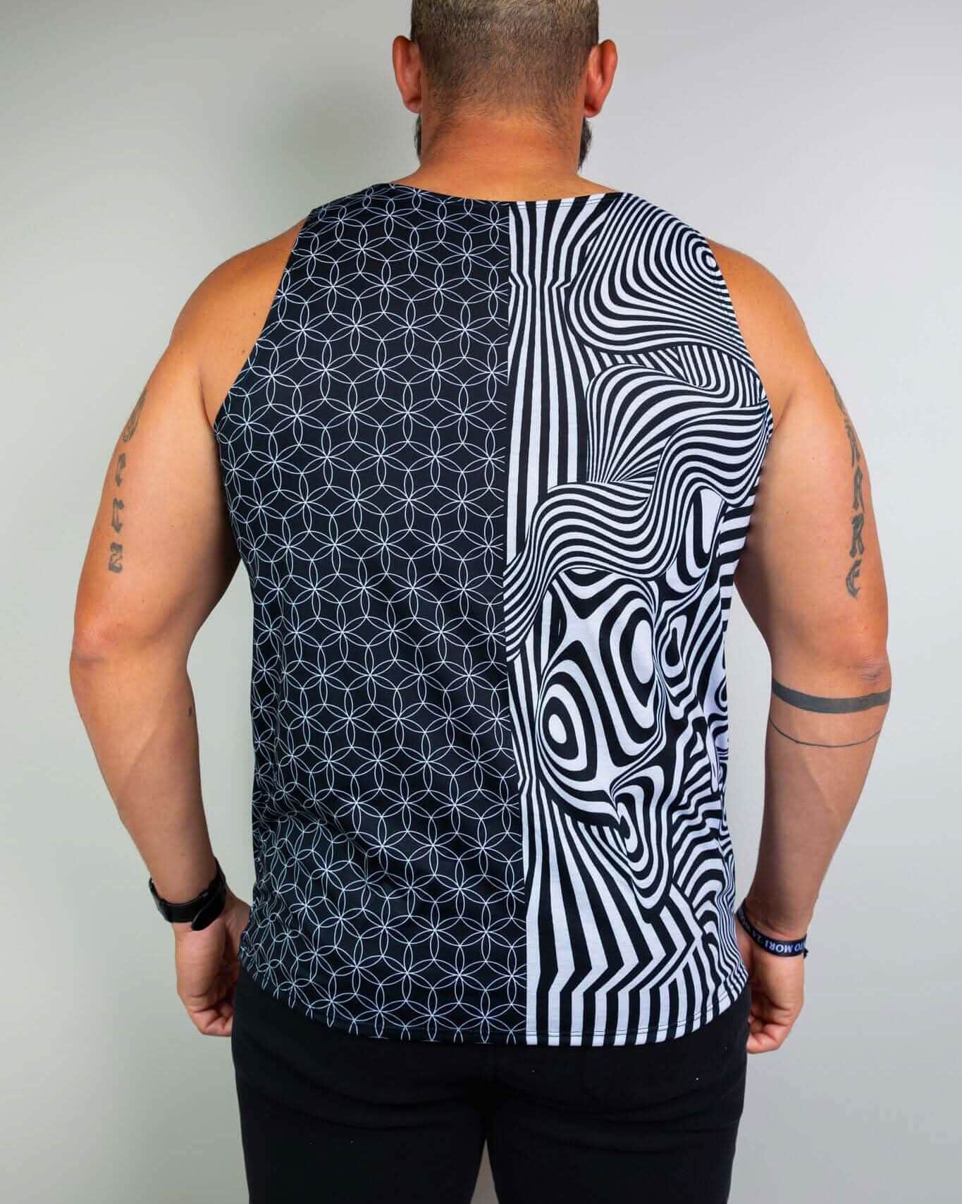 Duality rave bodysuit tank top back view showing black white geometric optical illusion festival outfit design