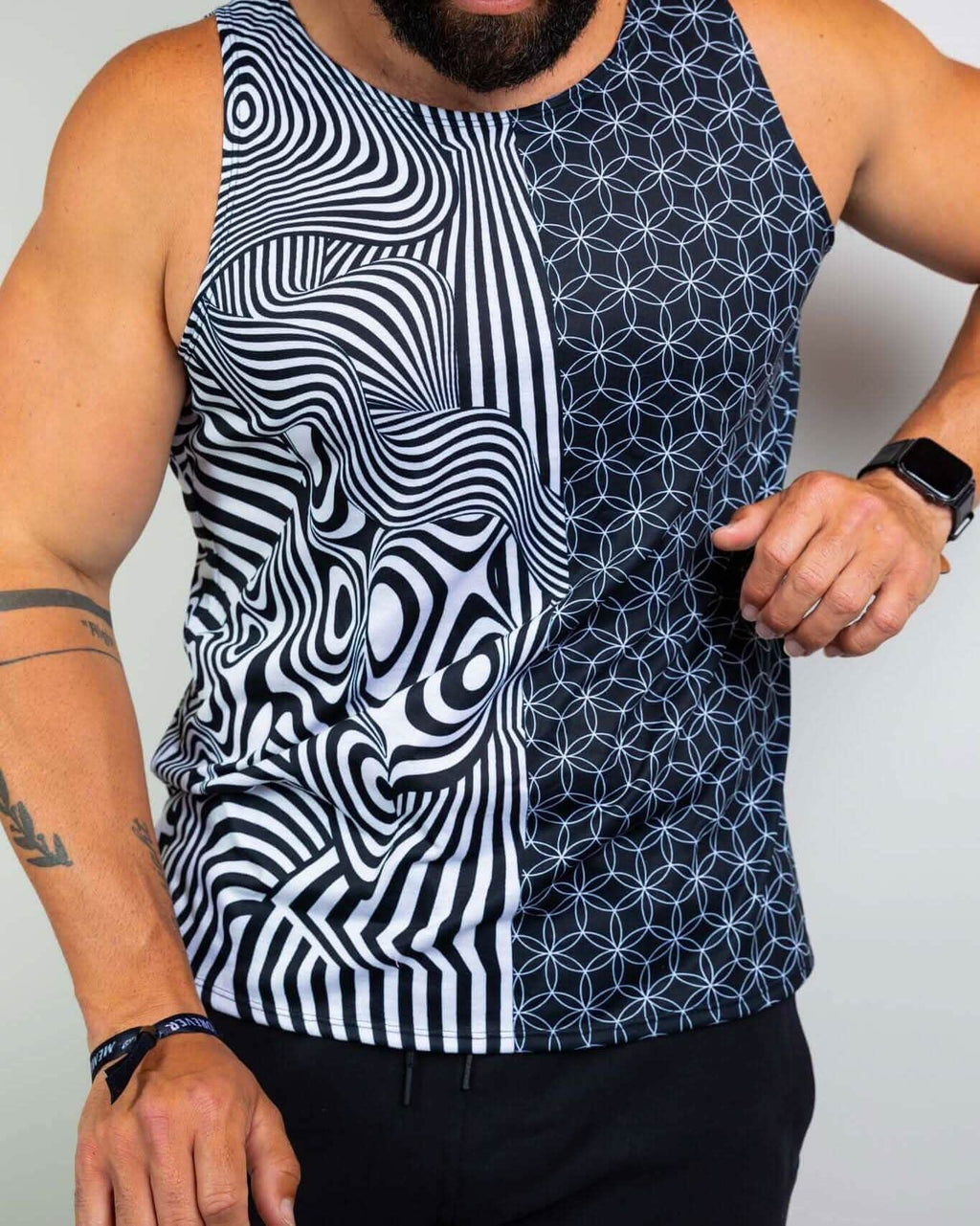 Rave bodysuit style Duality unisex tank top with black white optical illusion pattern front view male model
