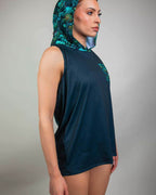 Rave bodysuit style Faewood hooded tank top in dark teal with mystical forest print hood, side profile view