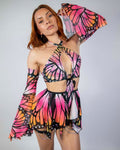 Pink orange Monarch butterfly rave bodysuit with matching arm sleeves modeled front view studio shot