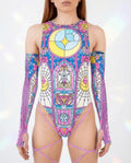 Moonlight Sideboob Bodysuit with Leg Straps, front view, showing pastel stained-glass rave pattern