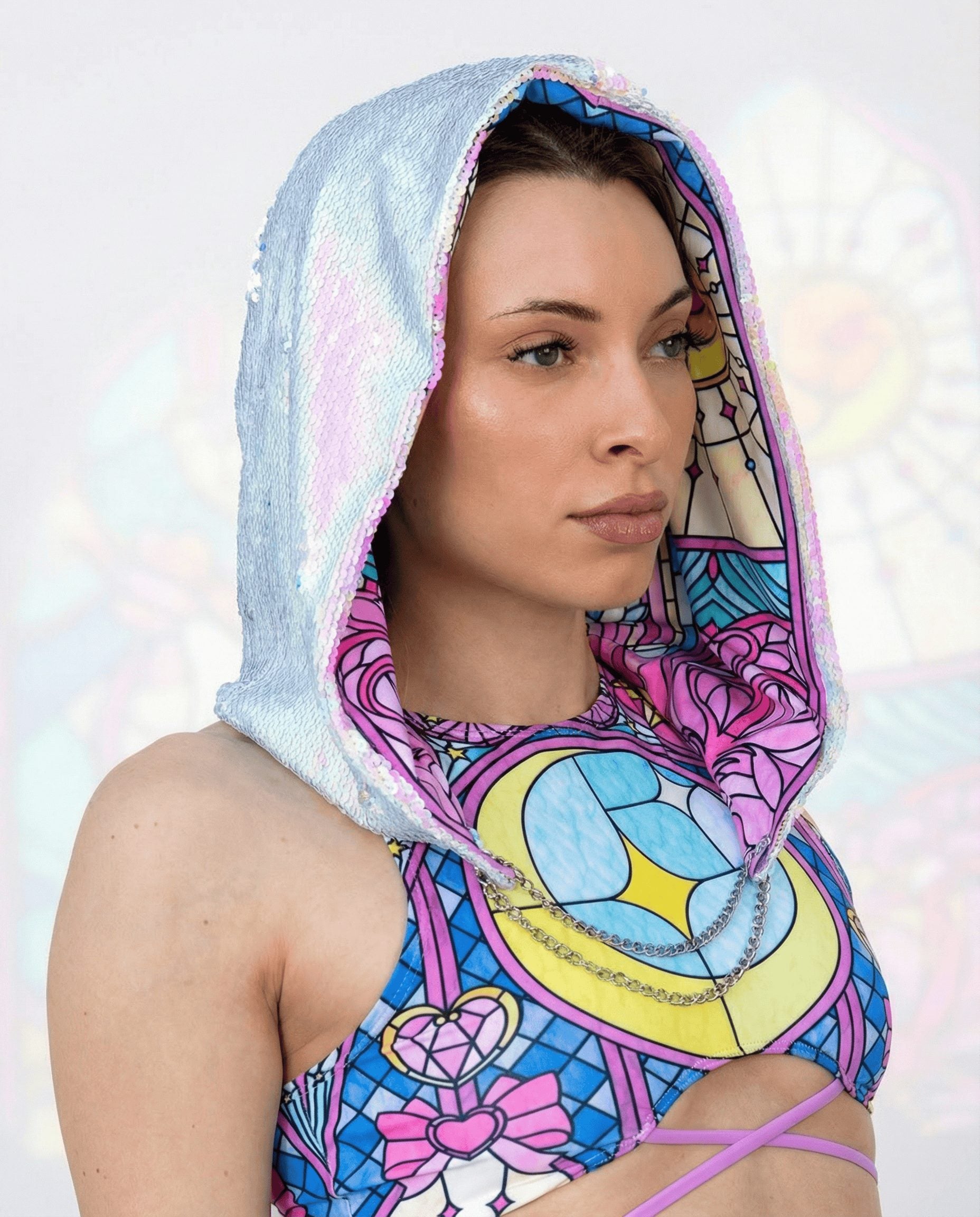 Moonlight Sequin rave bodysuit with matching sequin hood, multicolor stained glass pattern, festival outfit front view