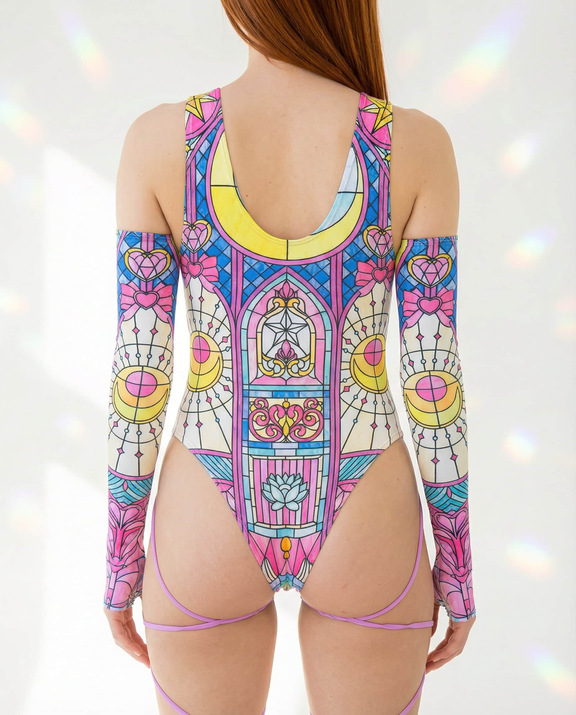 Back view of Moonlight rave bodysuit with stained glass pattern, cold shoulder sleeves and leg straps