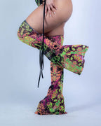 Intensity Cross Faded Bodysuit Set in neon green, pink, and black, viewed from the side, perfect for rave festivals.