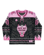 A flat-lay front view of the limited edition Cute But Psycho Hockey Jersey, featuring pink and black colors, perfect for a rave or festival.