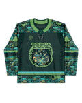 Faewood Hockey Jersey front view, showcasing a dark green rave top with an enchanted forest pattern and a central magical woodland graphic.