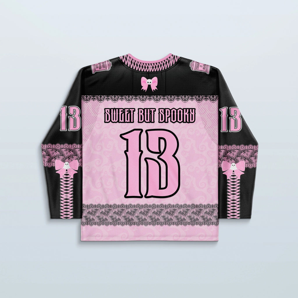 Back of the Boo Hockey Jersey in pink and black, featuring 'SWEET BUT SPOOKY' text and a large '13', perfect for a spooky-sweet rave festival look.