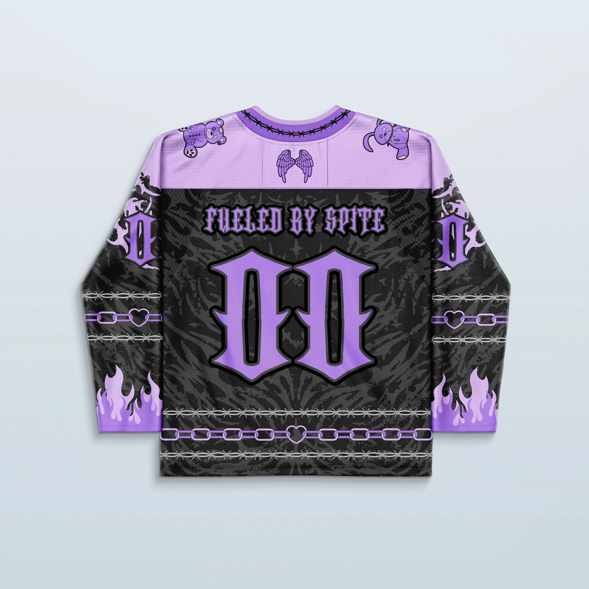 The back of the Cute But Psycho V2 Purple rave jersey, showcasing a black and purple design with "FUELED BY SPITE" text, a large 'M', and purple flame details on the sleeves, perfect for a festival.