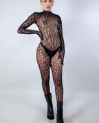 Cheetahlicious Full Body Fishnet Jumpsuit in black, shown front view on a model, perfect rave festival wear.