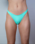 Mint green Risk rave pants bottoms front view on model for festival outfit styling