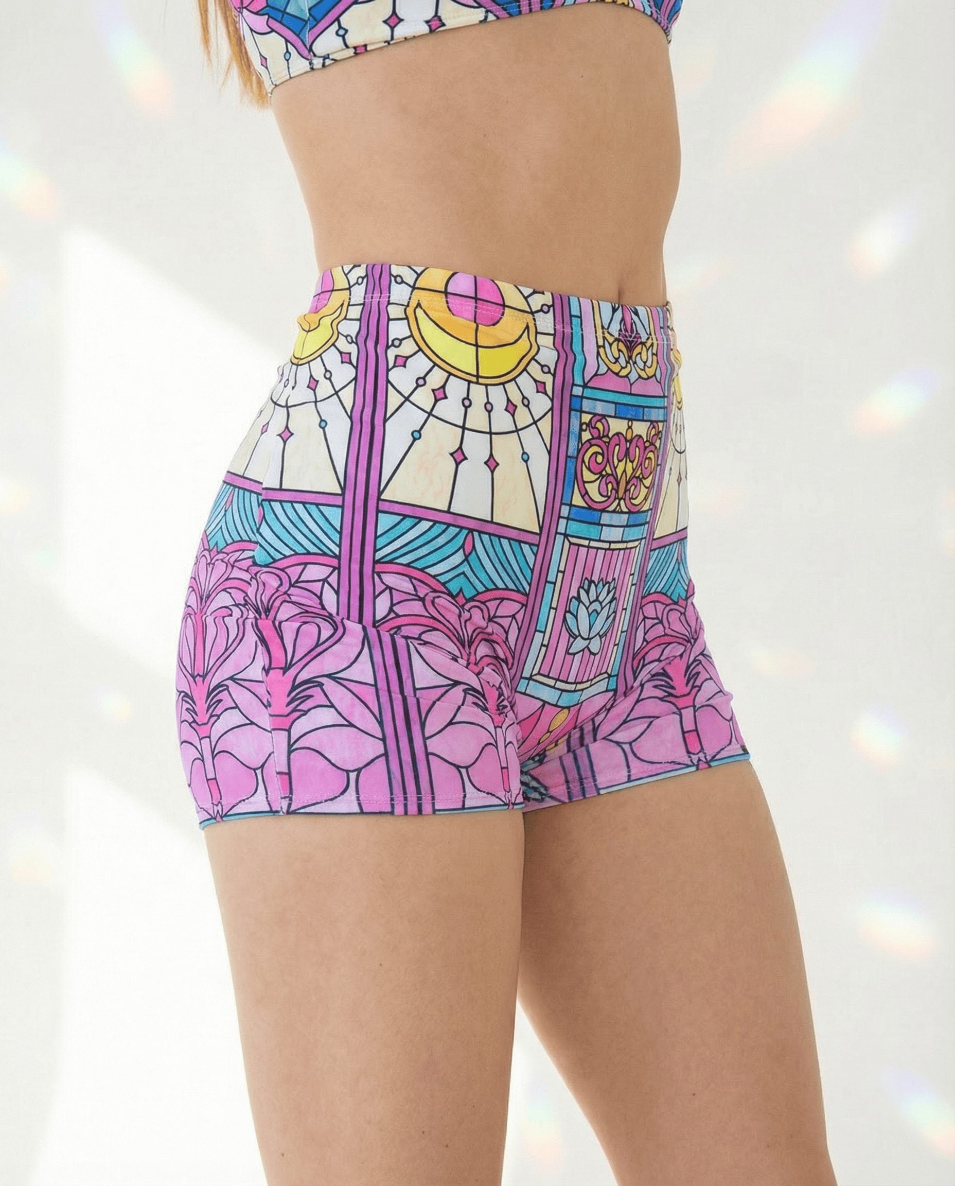 Pink purple rave pants Moonlight high waisted shorts with stained glass moon lotus print festival wear side view