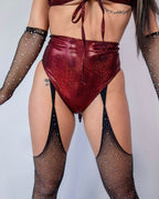Phoenix High Waisted rave pants in sparkly red with black fishnet stockings - festival outfit front view