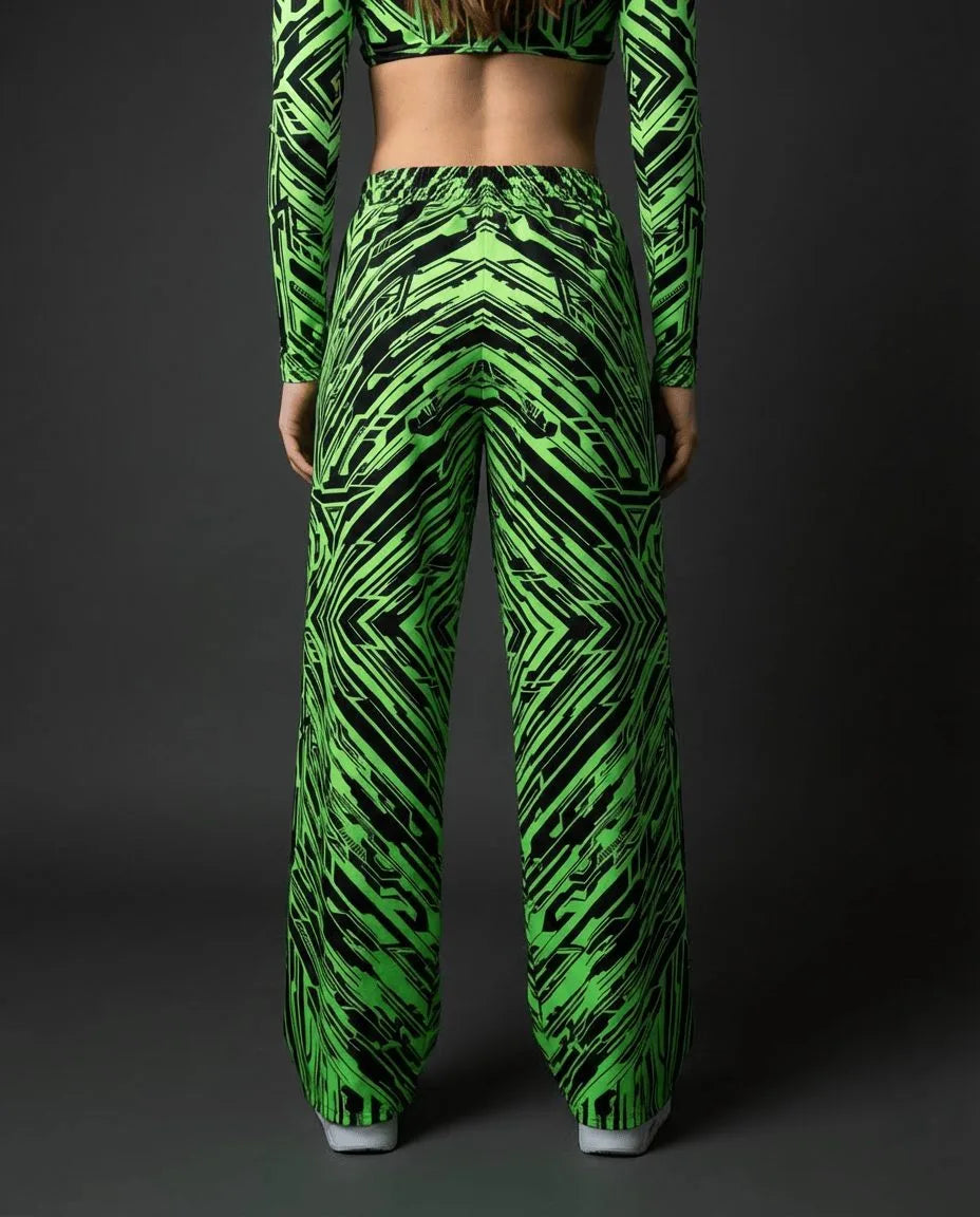Techtronix Lucy Pants and matching crop top from the back, featuring a striking acid green and black circuit pattern, perfect for rave festivals.