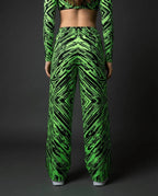 Techtronix Lucy Pants and matching crop top from the back, featuring a striking acid green and black circuit pattern, perfect for rave festivals.