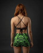 Back view of Techtronix High Waist Shorts, featuring neon lime green and black circuitry pattern, perfect for rave festivals.