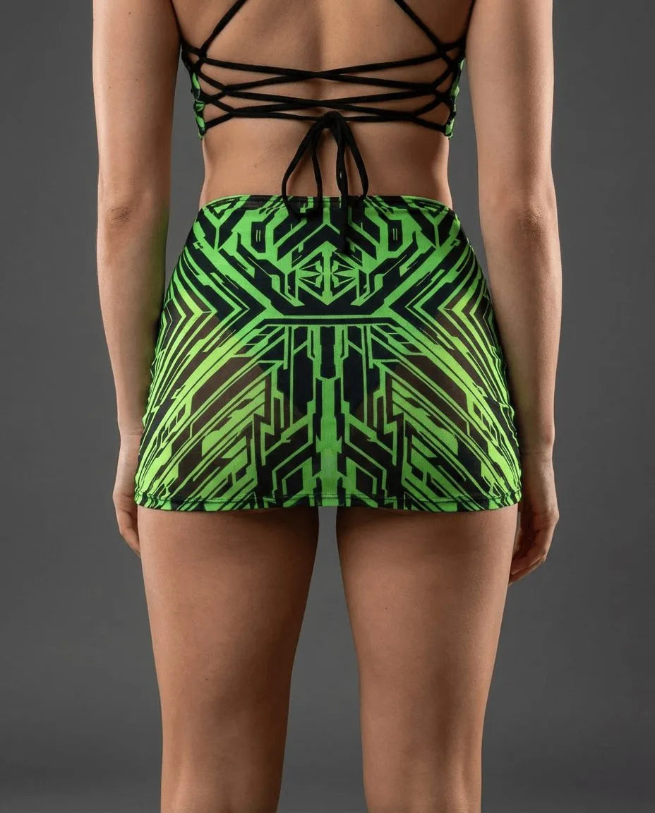 Techtronix Mesh Extra Mini Skirt from the back, featuring neon lime circuit patterns on black mesh, perfect for rave festivals.