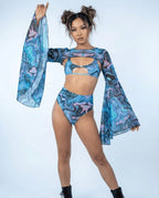 Glacial Mesh Bell Sleeves front view, featuring a swirling aqua, lavender, royal blue, and black pattern, perfect for rave festivals.