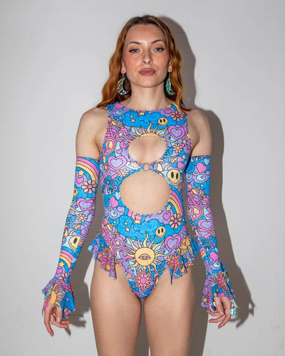 Groovy Spellcaster Arm Sleeves on a model, front view, showcasing the vibrant pastel psychedelic rave print.
