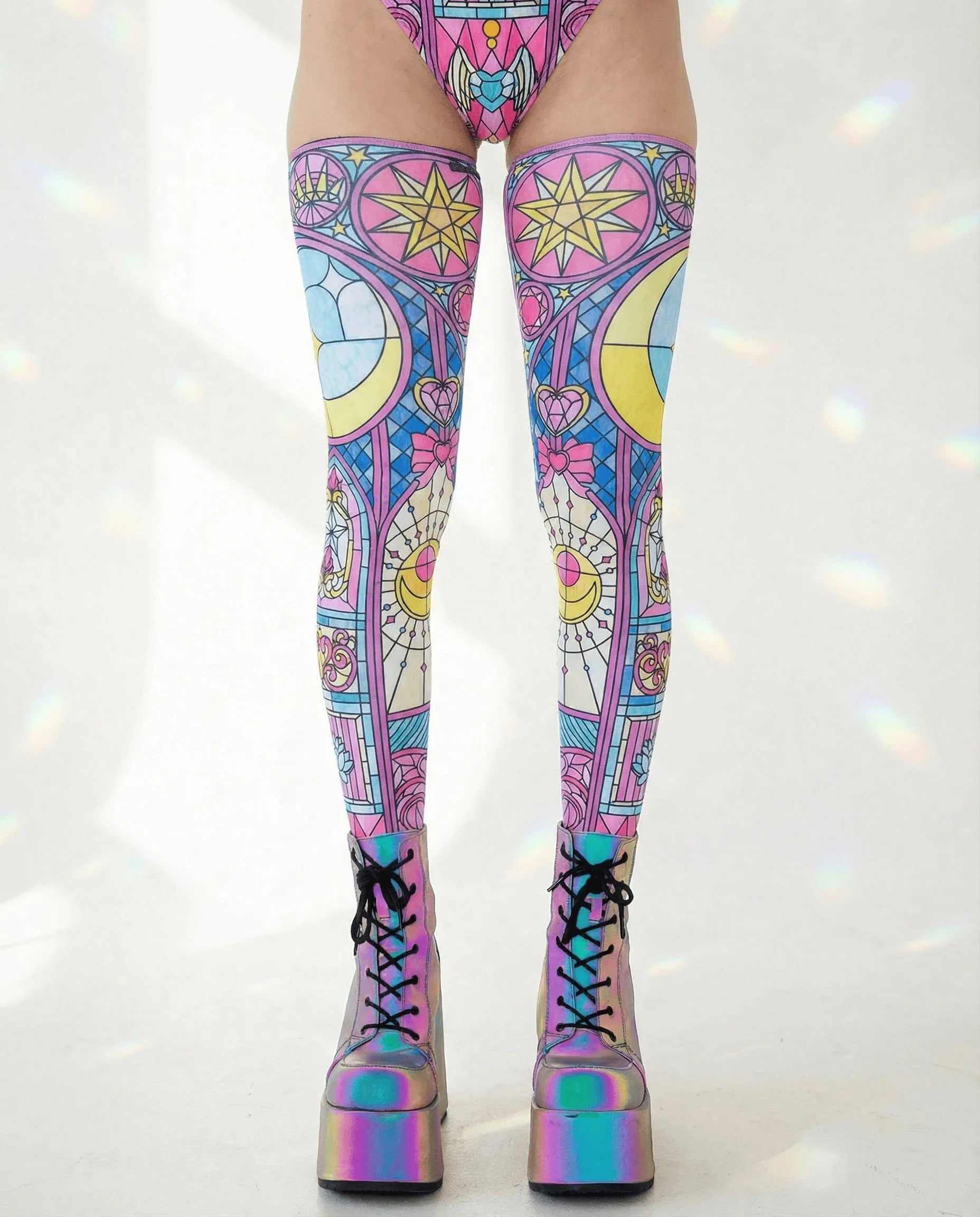Moonlight Leg Sleeves in pastel stained-glass design, shown front on a model, perfect for rave festivals.