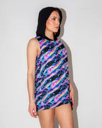 Acid Sky Men's Tank Top with Hood, side view, showing vibrant neon pink, blue, and purple rave pattern