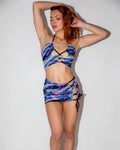 Acid Sky Ibiza Top front view, featuring a multi-color psychedelic pattern with electric blue and neon magenta, perfect for rave festivals.